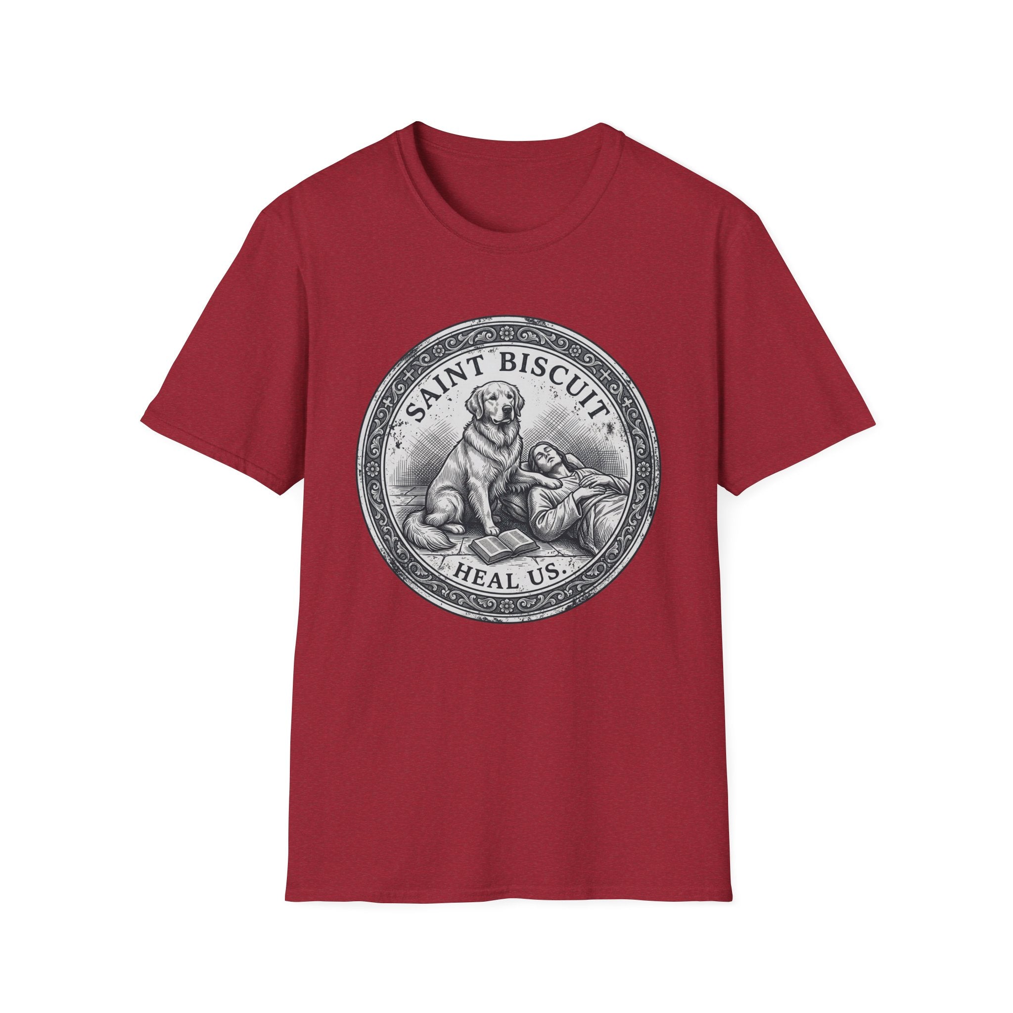 Saint Biscuit Heal Us T-shirt flat lay in cardinal red, featuring a vintage-style medallion graphic of a golden retriever dog watching over a reclining figure with the text 'Saint Biscuit Heal Us'.