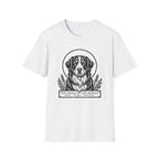 Holy Orders | Bernese Mountain Dog T-Shirt flat lay on navy shirt featuring a stained glass style illustration of a Bernese Mountain Dog depicted as a holy figure with a golden halo and the text 'Holy Orders.'