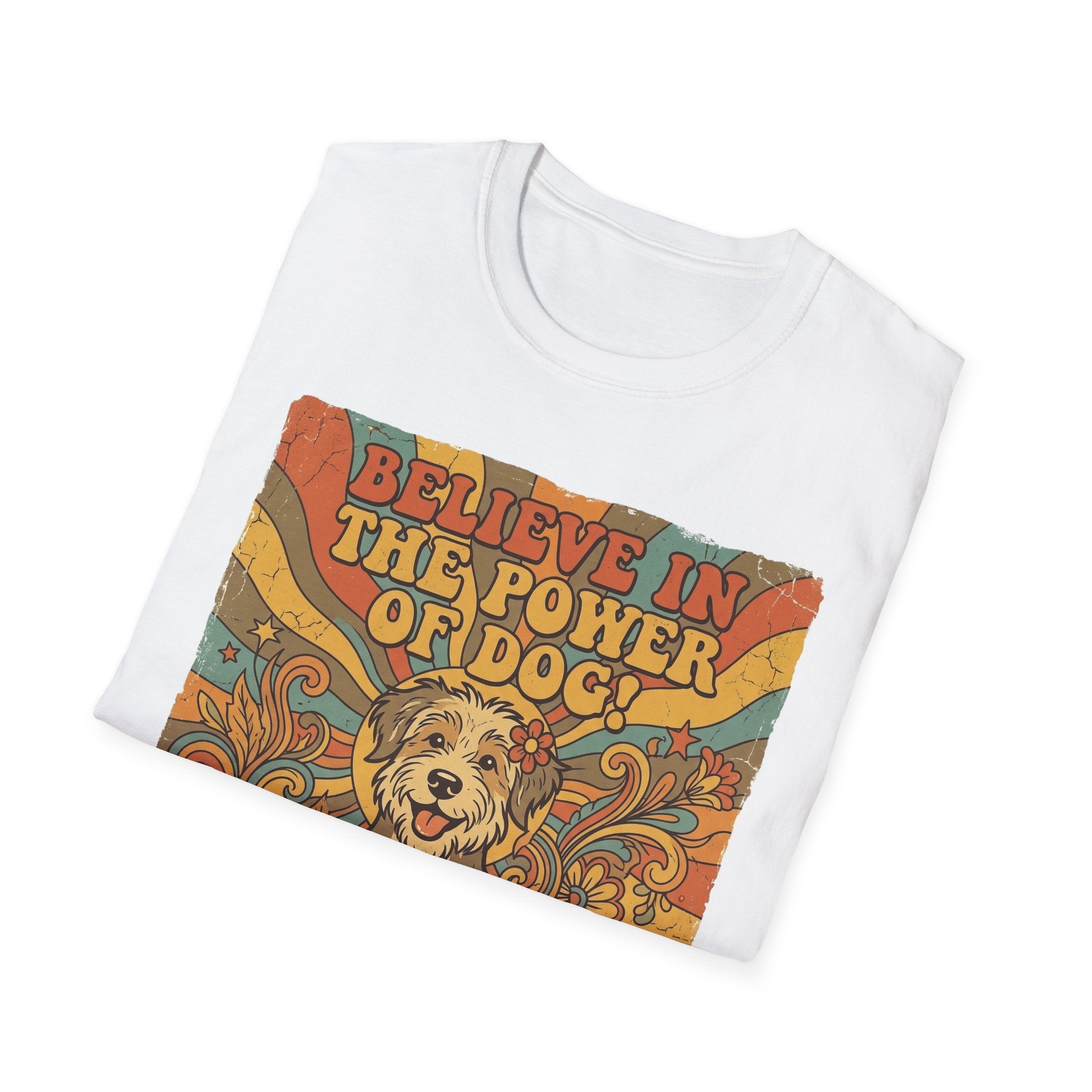 Believe in the Power of Dog Retro T-Shirt folded flat lay in white, showing the vintage 70s graphic of a fluffy dog face with rainbow rays and groovy text.