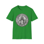 Saint Noodles Guide Us T-Shirt flat lay in kelly green, featuring a vintage medallion graphic of a basset hound standing upright holding a staff with a fish, alongside a small child, with the text 'Saint Noodles Guide Us'.