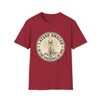 I Stand Amazed Golden Retriever T-Shirt flat lay in cardinal red, featuring a circular vintage-style graphic of a golden retriever with a halo and the text "I Stand Amazed in the Presence of Dog" with Dogma House branding.