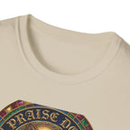 Praise Dog From Whom All Blessings Flow Corgi T-Shirt close-up detail of the collar area on a natural tan shirt, showing the jewel-encrusted border and gold gothic Praise Dog lettering.