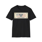 In Dog We Trust Bill T-Shirt flat lay in black, featuring a currency-style graphic of a dog portrait with a halo set against a vintage American flag, printed with the text 'In Dog We Trust.'