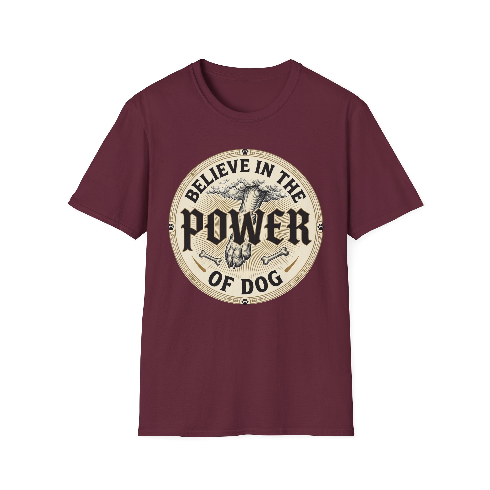 Believe in the Power of Dog Paw T-shirt flat lay in maroon, featuring a circular vintage badge graphic of a dog paw raised like a fist from clouds above crossed bones, with paw print accents and bold text.