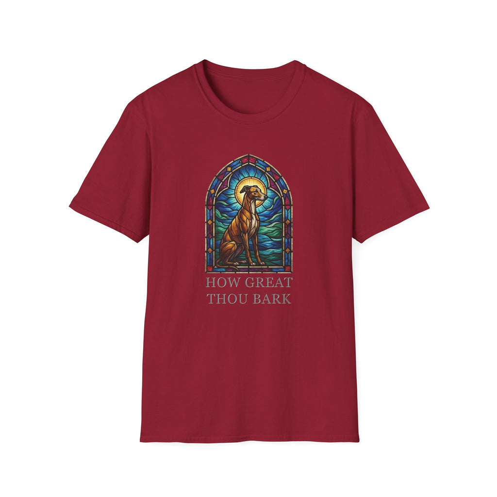 How Great Thou Bark Sight Hound T-shirt flat lay, cardinal red shirt featuring a stained-glass style arched window graphic of a seated sight hound dog with a halo and the text 'How Great Thou Bark.'