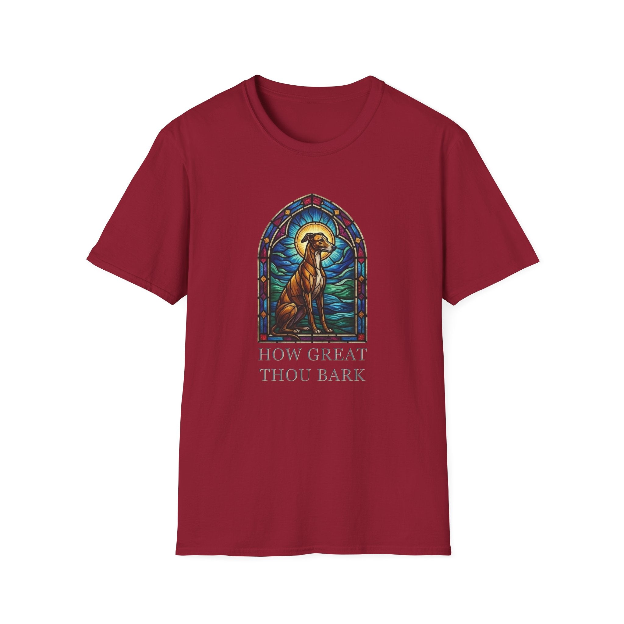 How Great Thou Bark Sight Hound T-shirt flat lay, cardinal red shirt featuring a stained-glass style arched window graphic of a seated sight hound dog with a halo and the text 'How Great Thou Bark.'