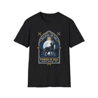 Believe in the Power of Dog Black Lab T-Shirt in black, flat lay view showing a gothic arch-framed graphic of a halo-wearing black Labrador standing under a full moon with a starry night sky, paw prints, crossed bones, and the words 'Strength Devotion Love'.