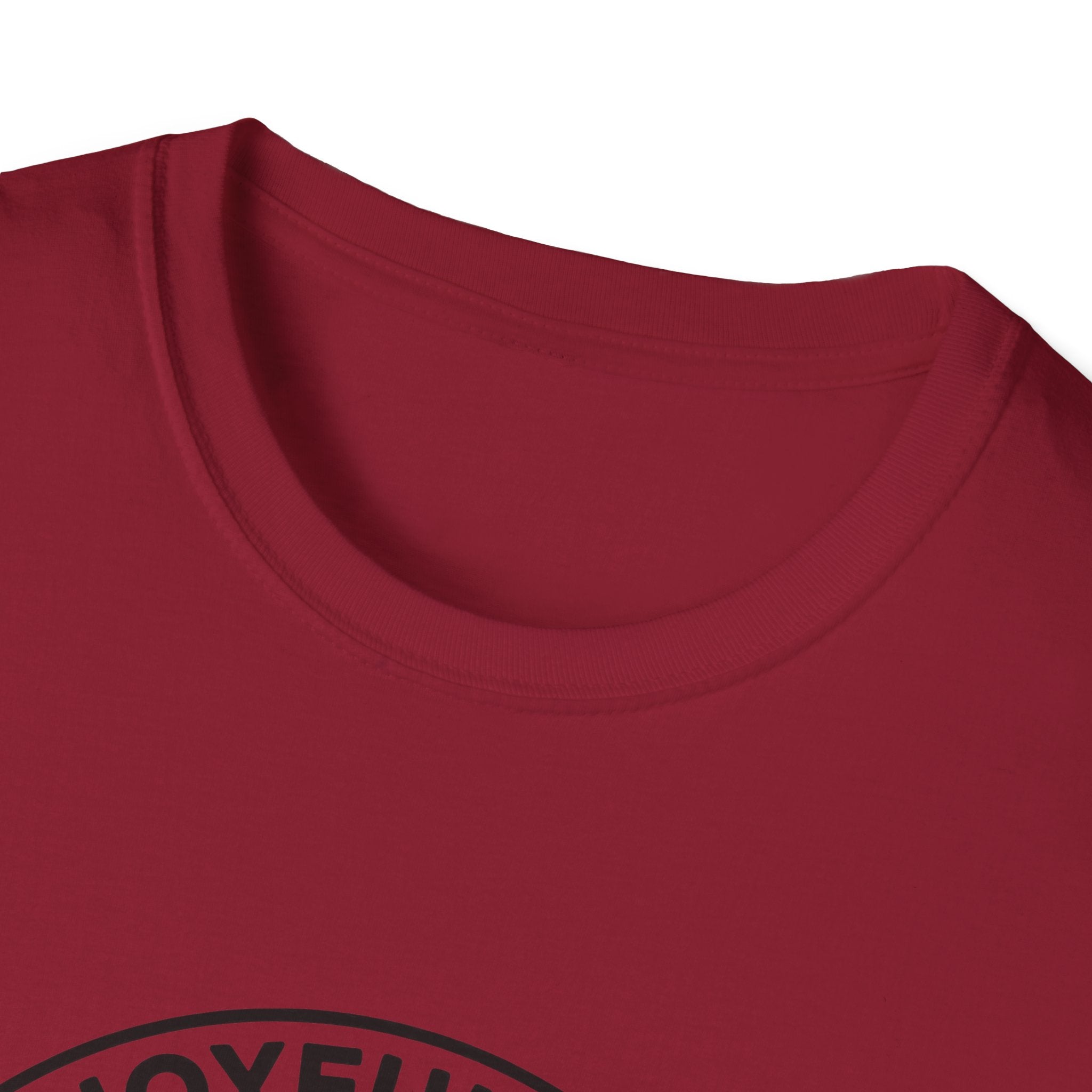 The Joyful Sound of Barking T-shirt close-up detail shot on a cardinal red shirt, showing the circular badge graphic with the 'Joyful Sound' lettering at the neckline.