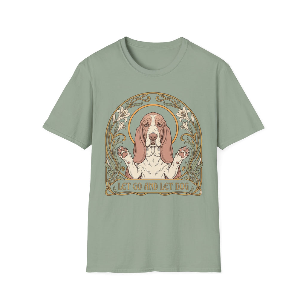 Let Go Let Dog Basset Hound T-Shirt in sage green, flat lay, featuring an Art Nouveau-style oval frame with floral motifs and a serene basset hound raising both paws with the text 'Let Go and Let Dog'.