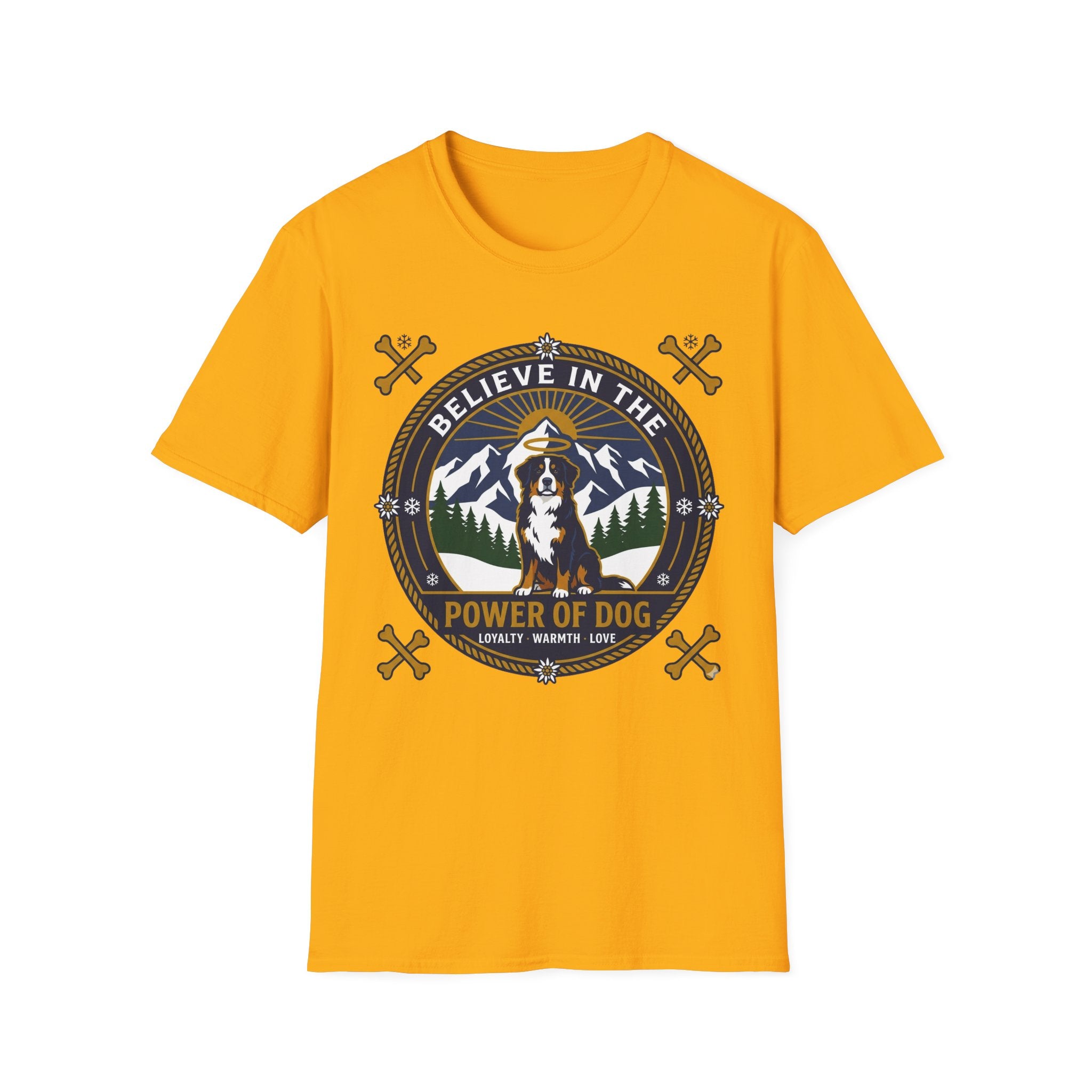 Believe in the Power of Dog Bernese T-Shirt in gold yellow, flat lay view showing a circular badge graphic with a halo-wearing Bernese Mountain Dog set against a mountain and forest landscape, with crossed bones and the words 'Loyalty Warmth Love'.