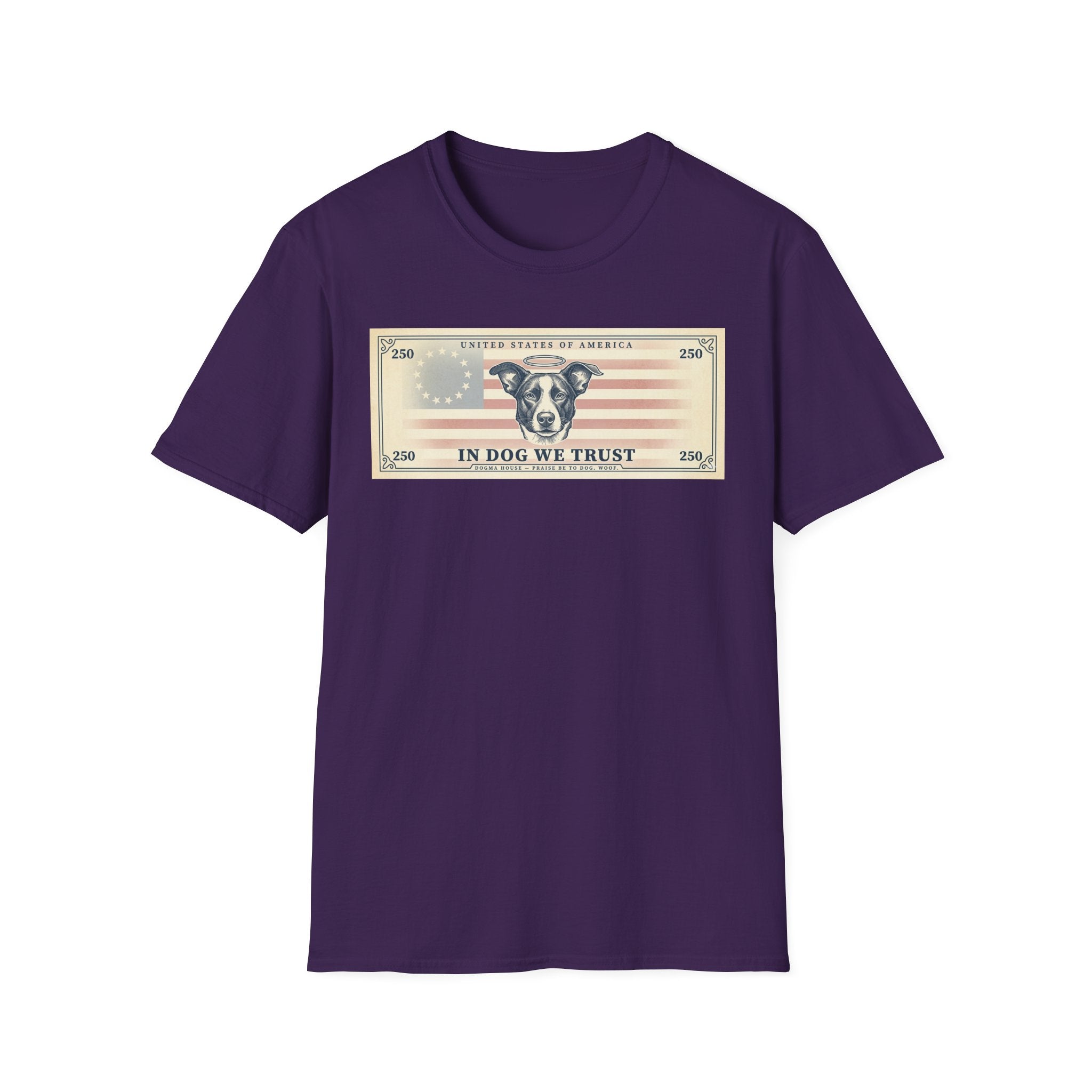 In Dog We Trust Bill T-Shirt flat lay in purple, featuring a currency-style graphic of a dog portrait with a halo set against a vintage American flag, printed with the text 'In Dog We Trust.'