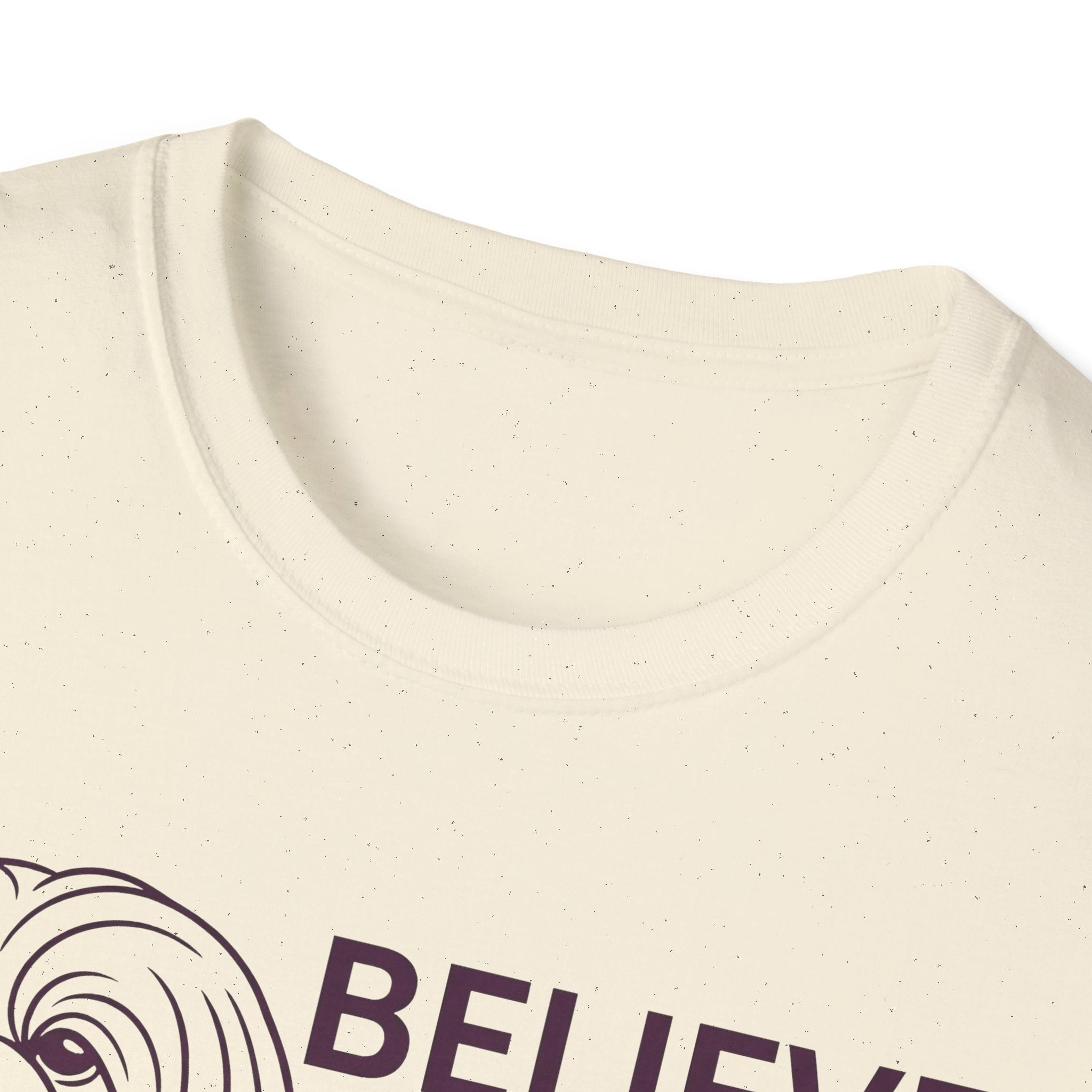 Believe in the Power of Dog Shih Tzu Line Art T-Shirt in natural cream, close-up detail of the neckline and upper chest showing the top of the Shih Tzu line art and Believe text.