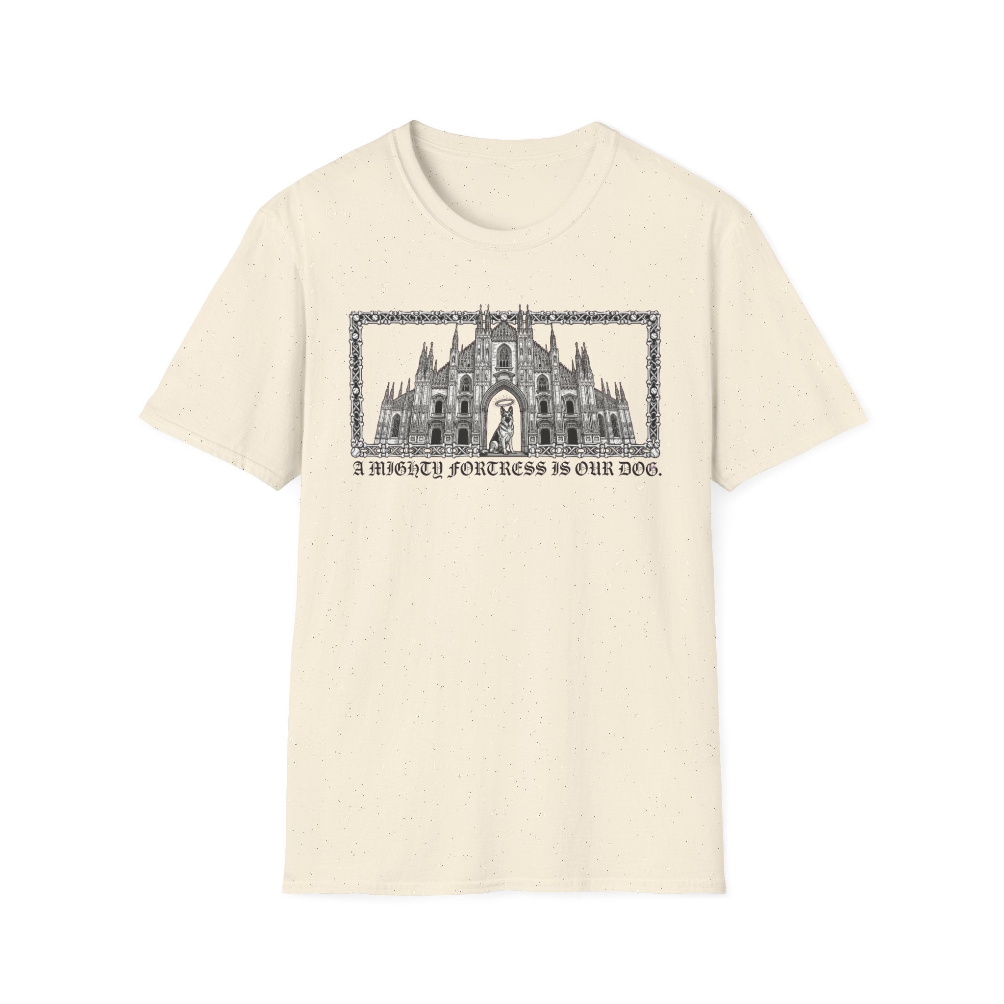 A Mighty Fortress is Our Dog T-Shirt flat lay in natural/cream featuring a detailed gothic cathedral illustration with a dog standing in the doorway, framed in an ornate border with text below.