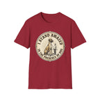 I Stand Amazed Great Dane T-Shirt flat lay in cardinal red, featuring a circular vintage-style graphic of a towering Great Dane with a halo and a small human figure, with text "I Stand Amazed in the Presence of Dog."