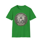 Saint Pretzel Forgive Us T-Shirt flat lay on bright green shirt featuring an engraved medallion design with a French Bulldog saint and the text St. Pretzel Forgive Us.