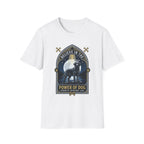 Believe in the Power of Dog Black Lab T-Shirt in white, flat lay view showing a gothic arch-framed graphic of a halo-wearing black Labrador standing under a full moon with a starry night sky, paw prints, crossed bones, and the words 'Strength Devotion Love'.