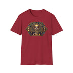 Praise Dog From Whom All Blessings Flow Corgi T-Shirt flat lay in cardinal red, featuring an ornate medieval stained-glass style graphic of a regal corgi seated in a jewel-encrusted octagonal frame with gold gothic lettering and dog bone and tennis ball accents.