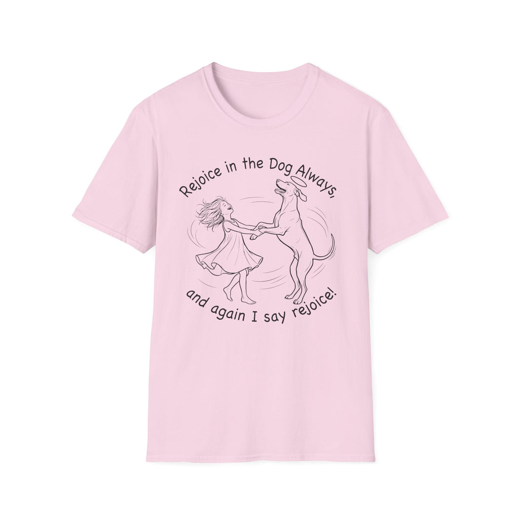 Rejoice in the Dog Rhodesian Ridgeback T-Shirt in light pink, flat lay mockup showing a woman joyfully dancing with a rearing Rhodesian Ridgeback line-art illustration and the text 'Rejoice in the Dog Always, and again I say rejoice!'