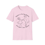 Rejoice in the Dog Rhodesian Ridgeback T-Shirt in light pink, flat lay mockup showing a woman joyfully dancing with a rearing Rhodesian Ridgeback line-art illustration and the text 'Rejoice in the Dog Always, and again I say rejoice!'