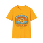 Believe in the Power of Dog Yellow Lab T-Shirt in gold yellow, flat lay view showing a retro-style oval badge with a halo-wearing yellow Labrador running joyfully through a sunlit field, with the words 'Joy Loyalty Love' and crossed bones.