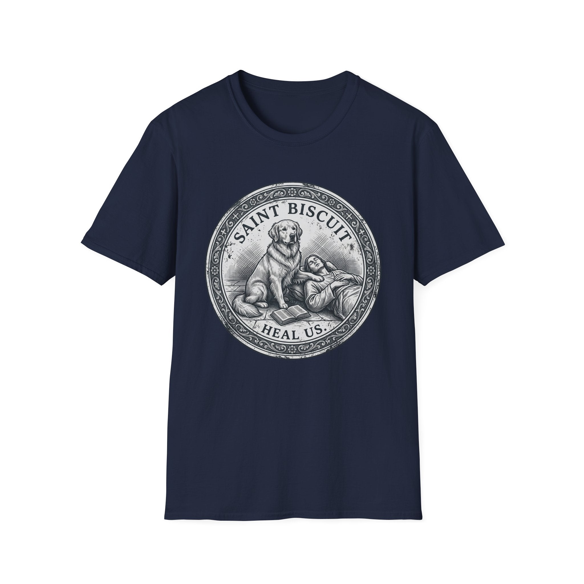 Saint Biscuit Heal Us T-shirt flat lay in navy blue, featuring a vintage-style medallion graphic of a golden retriever dog watching over a reclining figure with the text 'Saint Biscuit Heal Us'.