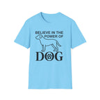 Believe in the Power of Dog T-Shirt flat lay in sky blue, featuring a line-art dog silhouette and the text Believe in the Power of Dog with a paw print accent.