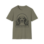 Holy Orders | Beagle T-Shirt flat lay on black shirt featuring a stained glass style illustration of a Beagle depicted as a holy figure with a golden halo and the text 'Holy Orders.'
