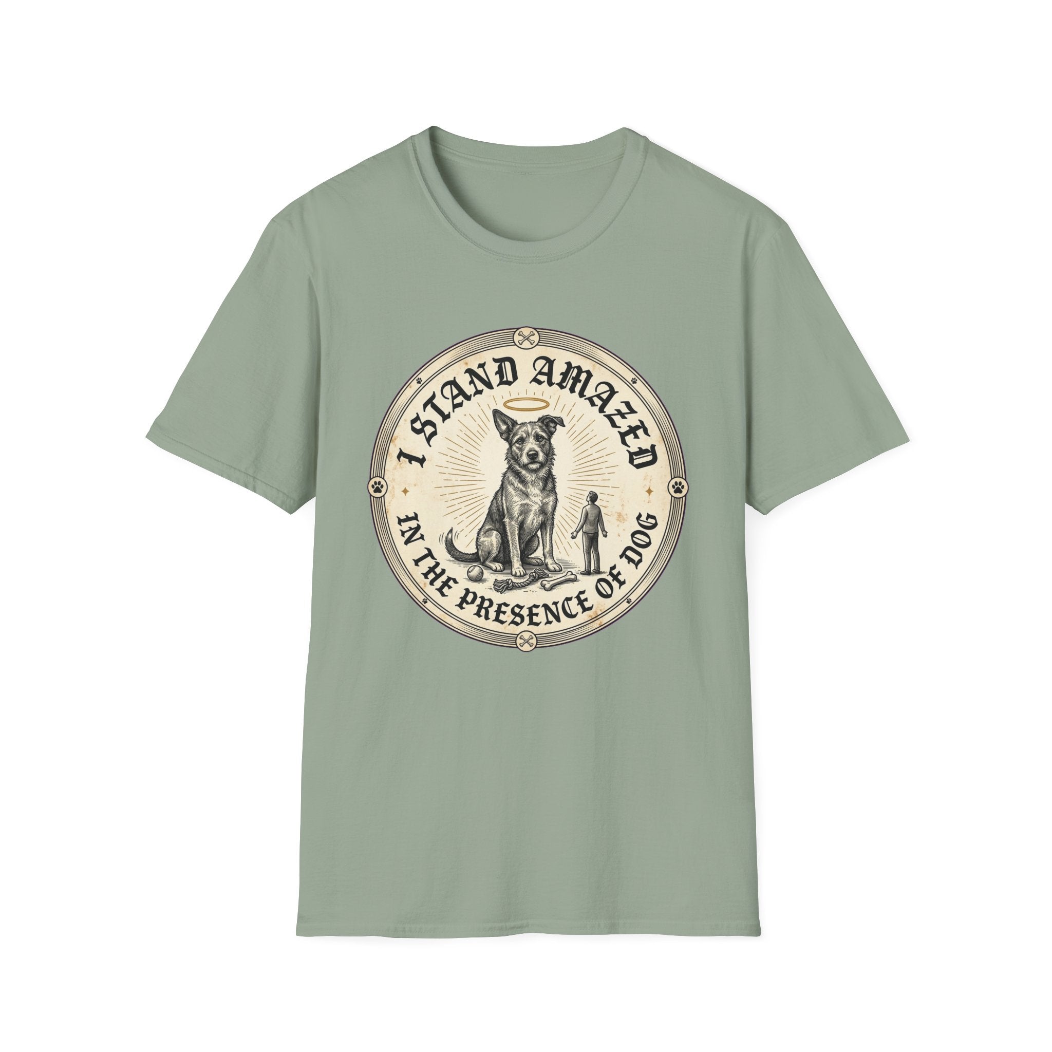 I Stand Amazed Rescue Mutt T-Shirt in sage green, flat lay front view featuring a vintage-style circular graphic of a halo-wearing mixed-breed rescue dog with the text 'I Stand Amazed in the Presence of Dog.'