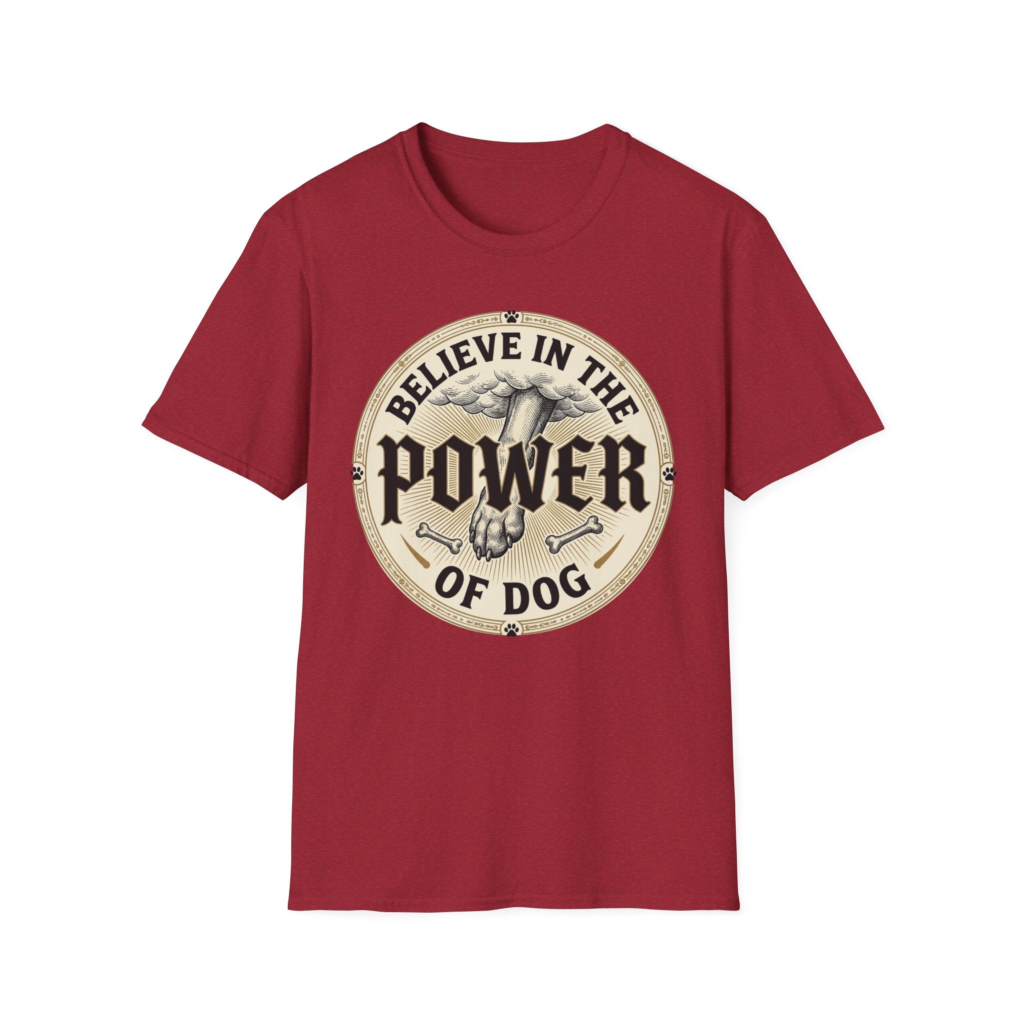 Believe in the Power of Dog Paw T-shirt flat lay in cardinal red, featuring a circular vintage badge graphic of a dog paw raised like a fist from clouds above crossed bones, with paw print accents and bold text.