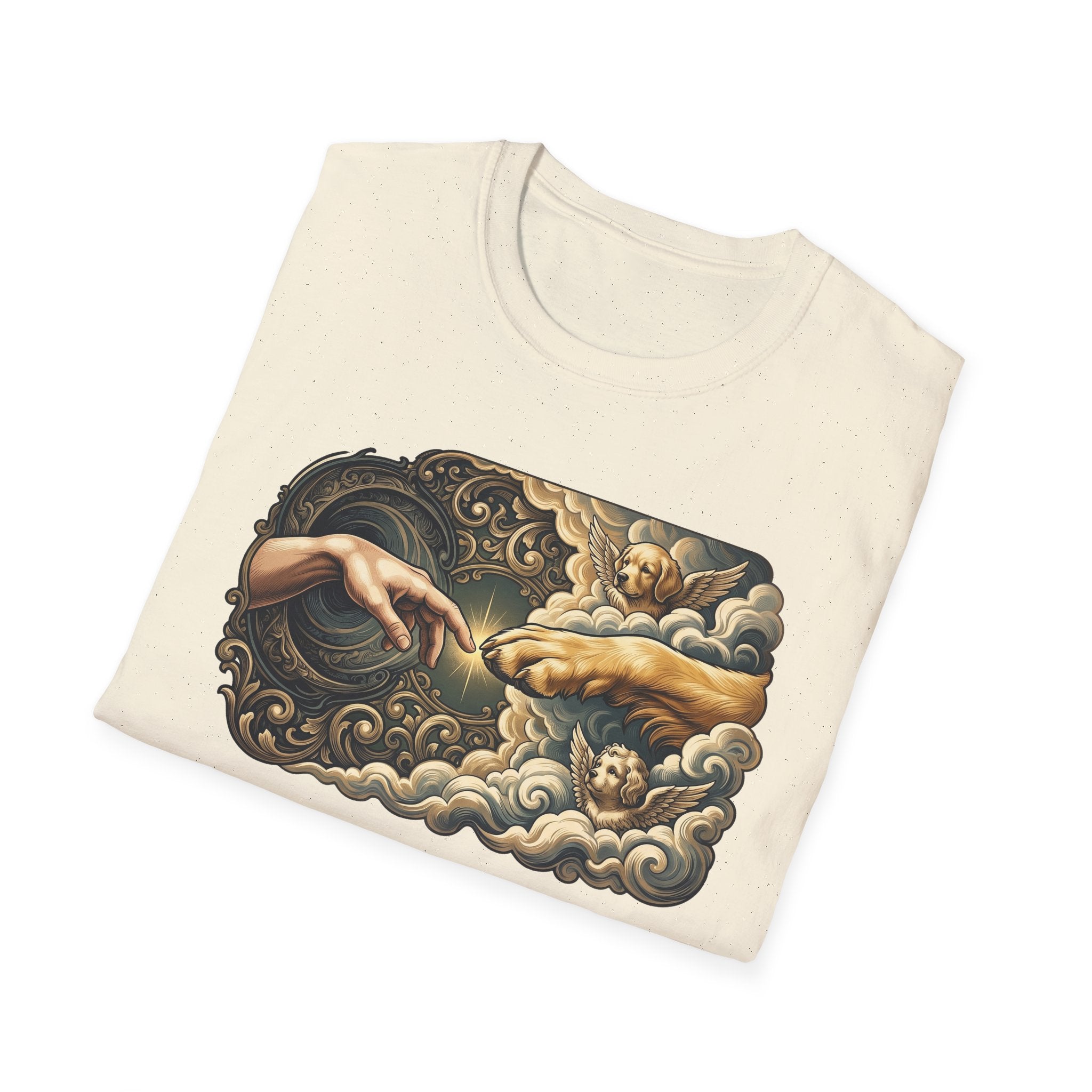 Creation of Adam T-Shirt folded flat lay in natural cream, showing the full baroque-framed dog parody of Michelangelo's Creation of Adam with a dog's paw meeting a human hand.