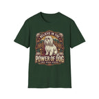 Believe in the Power of Dog Shih Tzu Throne T-Shirt in forest green, flat lay, featuring a vintage badge graphic of a fluffy white Shih Tzu seated regally on a throne surrounded by lotus flowers and mountains, with text reading Believe in the Power of Dog and Grace, Wisdom, Devotion.