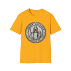 Saint Noodles Guide Us T-Shirt flat lay in gold yellow, featuring a vintage medallion graphic of a basset hound standing upright holding a staff with a fish, alongside a small child, with the text 'Saint Noodles Guide Us'.