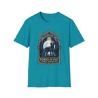 Believe in the Power of Dog Black Lab T-Shirt in teal, flat lay view showing a gothic arch-framed graphic of a halo-wearing black Labrador standing under a full moon with a starry night sky, paw prints, crossed bones, and the words 'Strength Devotion Love'.