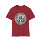 Saint Noodles Guide Us T-Shirt flat lay in cardinal red, featuring a vintage medallion graphic of a basset hound standing upright holding a staff with a fish, alongside a small child, with the text 'Saint Noodles Guide Us'.