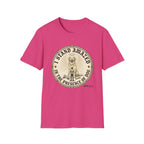 I Stand Amazed Golden Retriever T-Shirt flat lay in heliconia pink, featuring a circular vintage-style graphic of a golden retriever with a halo and the text "I Stand Amazed in the Presence of Dog" with Dogma House branding.