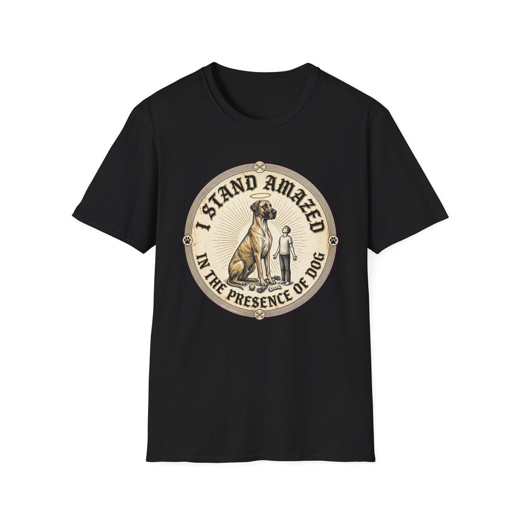 I Stand Amazed Great Dane T-Shirt flat lay in black, featuring a circular vintage-style graphic of a towering Great Dane with a halo and a small human figure, with text "I Stand Amazed in the Presence of Dog."