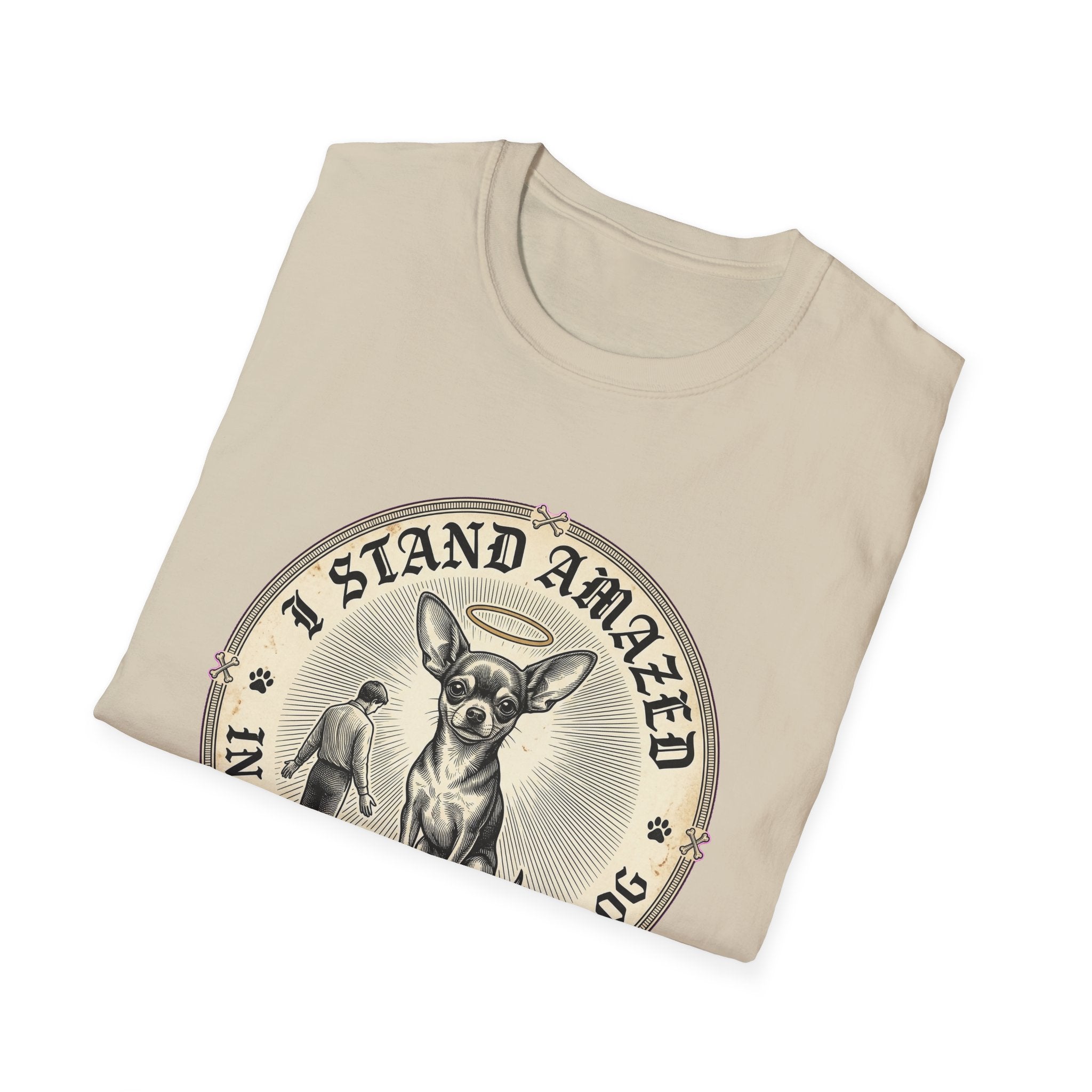 I Stand Amazed Chihuahua T-Shirt in sand, folded view showing the front graphic of the Chihuahua design with halo and 'I Stand Amazed' text.
