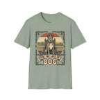 For the Love of Dog Pitbull T-Shirt flat lay on sage green shirt featuring a regal pitbull seated on a throne wearing a crown, with the text 'For the Love of Dog' in a vintage ornate frame with paw prints and bones.