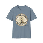 I Stand Amazed Golden Retriever T-Shirt flat lay in slate blue, featuring a circular vintage-style graphic of a golden retriever with a halo and the text "I Stand Amazed in the Presence of Dog" with Dogma House branding.