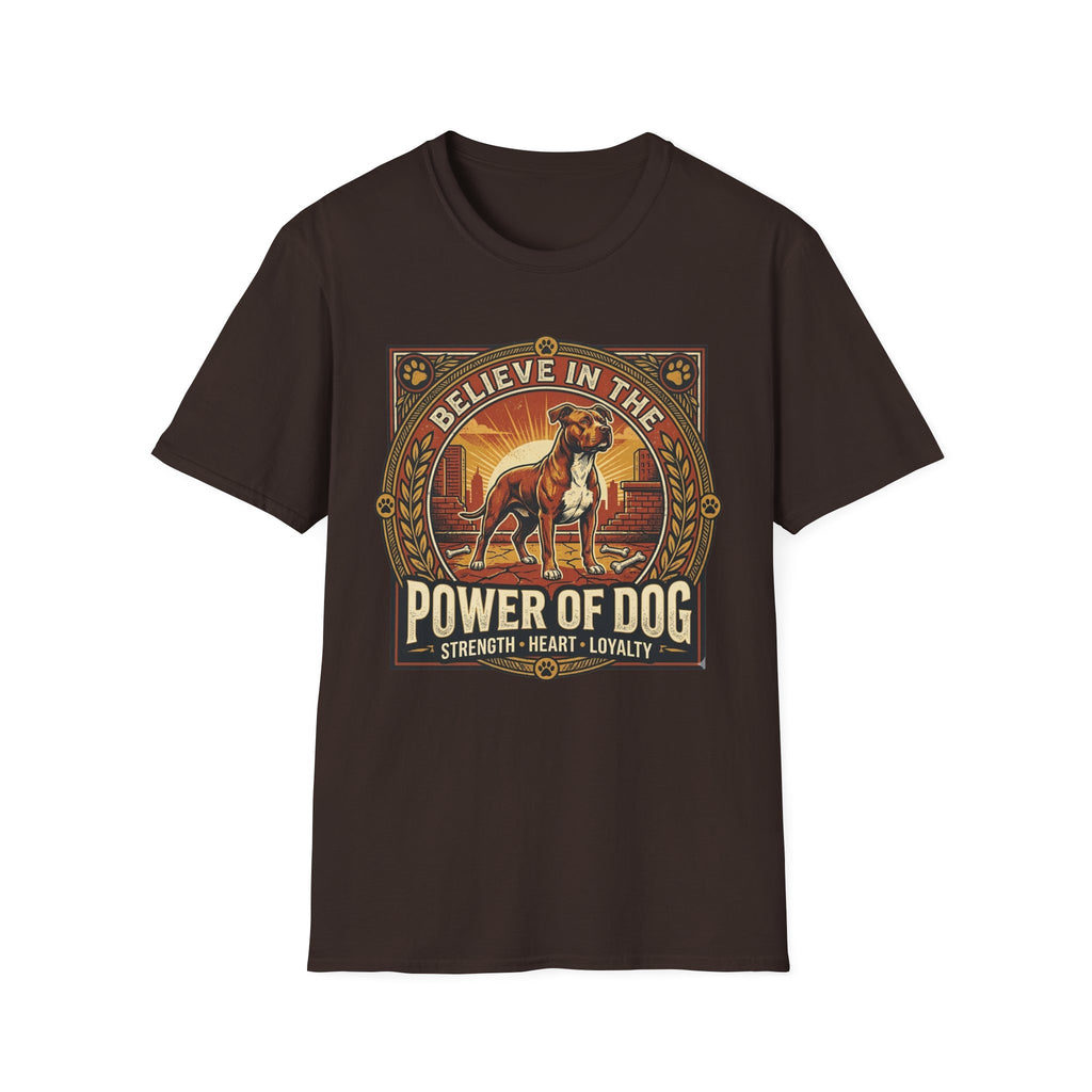 Believe in the Power of Dog Pitbull Cityscape T-Shirt in dark chocolate brown, flat lay, featuring a retro-style badge graphic of a muscular brown and white Pitbull standing proudly before a warm urban cityscape at sunset, with text reading Believe in the Power of Dog and Strength, Heart, Loyalty.