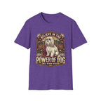 Believe in the Power of Dog Shih Tzu Throne T-Shirt in heather purple, flat lay, featuring a vintage badge graphic of a fluffy white Shih Tzu seated regally on a throne surrounded by lotus flowers and mountains, with text reading Believe in the Power of Dog and Grace, Wisdom, Devotion.