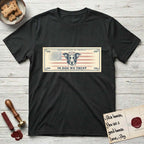 In Dog We Trust Bill T-Shirt flat lay in Black, featuring a vintage dollar-bill design with a haloed mixed-breed Dog at center, a Betsy Ross flag in the background, and bold currency-style "In Dog We Trust" typography.