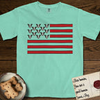 Lobo Head Flag T-Shirt flat lay in Island Reef, featuring an American flag with thirteen repeated black-and-white photos of a Pitbull-and-cattle-dog-mix Dog head in place of the stars and dusty red stripes.