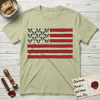 Lobo Head Flag T-Shirt flat lay in Pistachio, featuring an American flag with thirteen repeated black-and-white photos of a Pitbull-and-cattle-dog-mix Dog head in place of the stars and dusty red stripes.