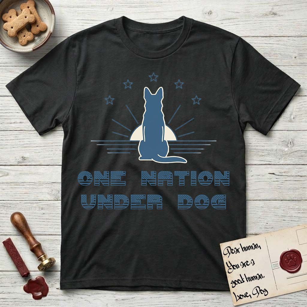 One Nation Under Dog T-Shirt flat lay in Black, featuring a minimalist design with a Dog silhouette over a radiating sunburst, five stars, and bold "One Nation Under Dog" typography.