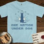 One Nation Under Dog T-Shirt flat lay in Chambray, featuring a minimalist design with a Dog silhouette over a radiating sunburst, five stars, and bold "One Nation Under Dog" typography.