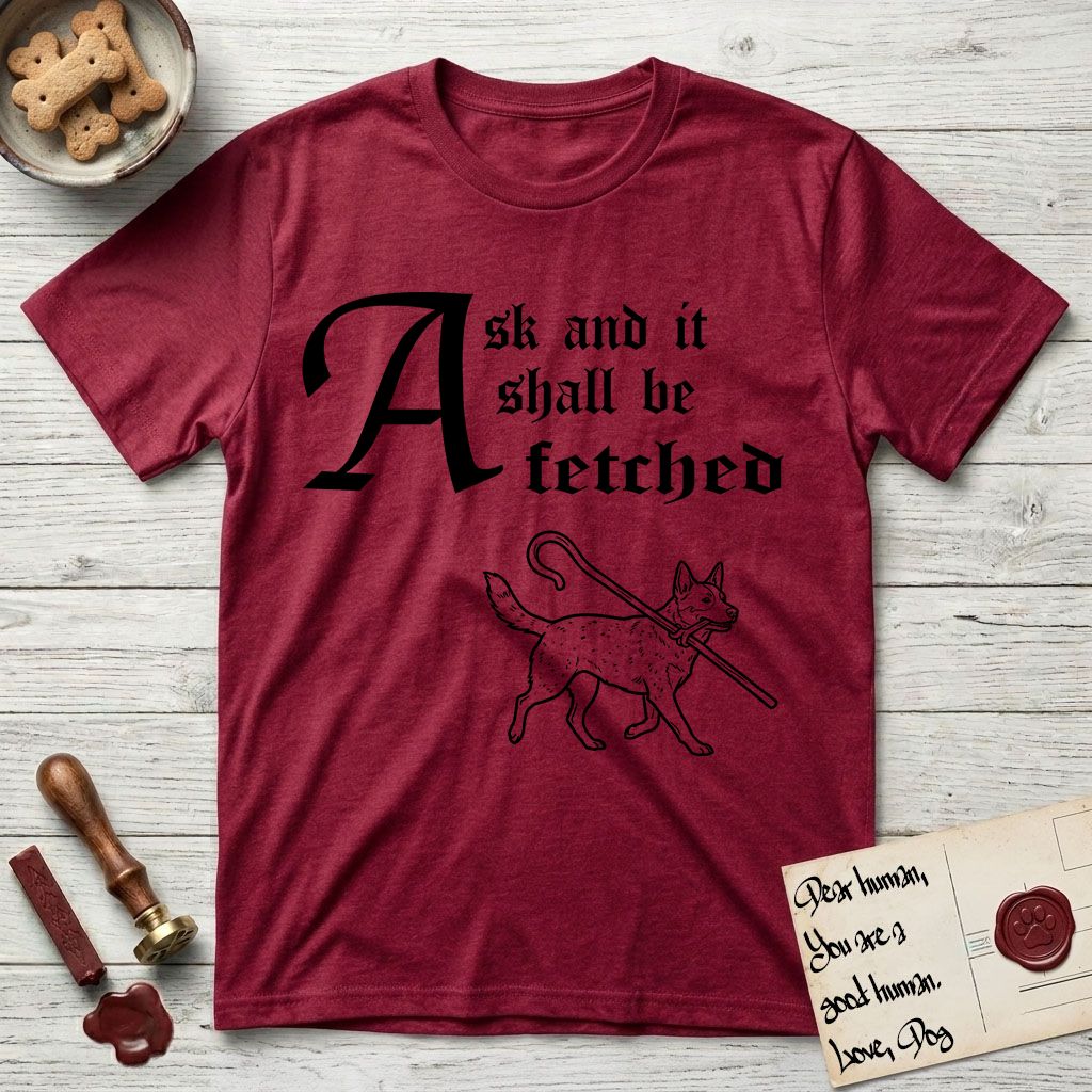 Ask and It Shall Be Fetched Australian Cattle Dog T-Shirt flat lay in Antique Cherry Red, featuring a sparse pen-and-ink illustration of an Australian Cattle Dog at a proud trot carrying a shepherd's crook.