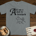 Ask and It Shall Be Fetched Australian Cattle Dog T-Shirt flat lay in Granite, featuring a sparse pen-and-ink illustration of an Australian Cattle Dog at a proud trot carrying a shepherd's crook.