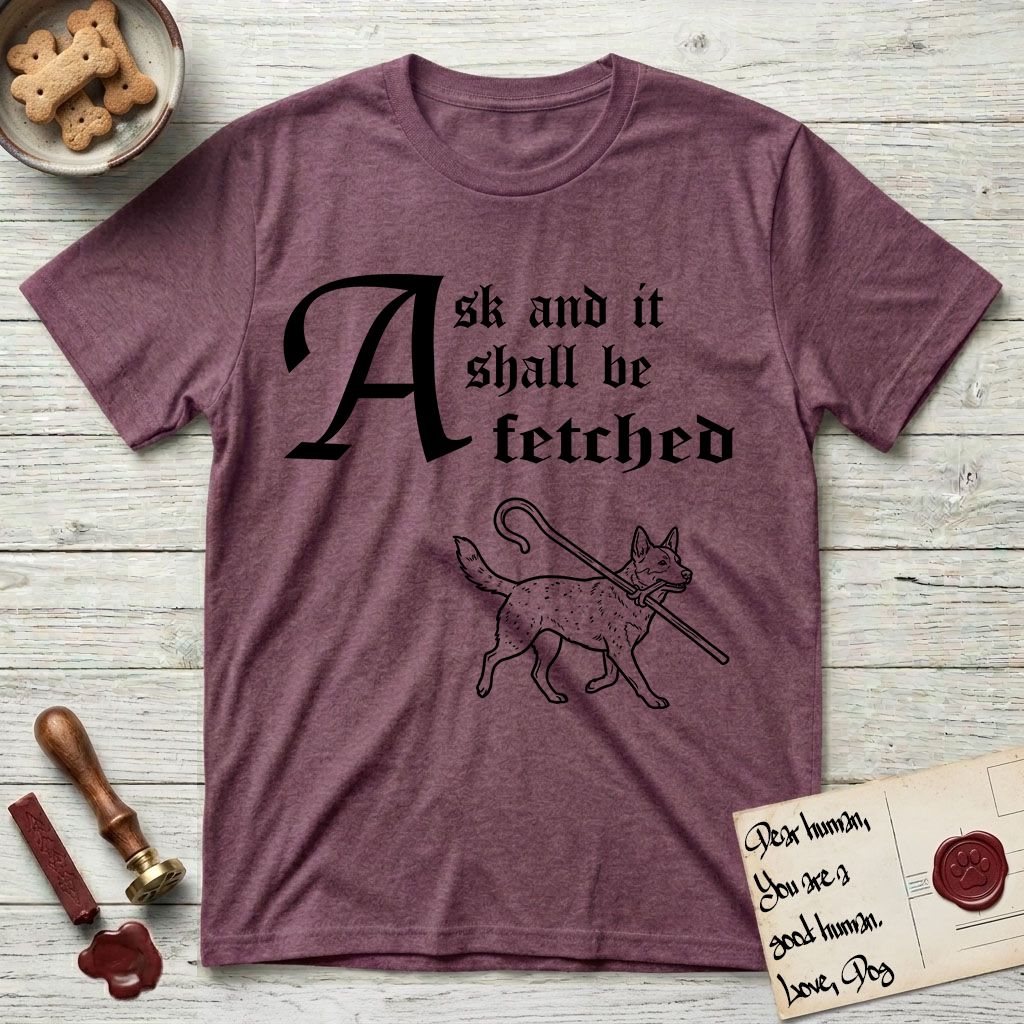 Ask and It Shall Be Fetched Australian Cattle Dog T-Shirt flat lay in Heather Maroon, featuring a sparse pen-and-ink illustration of an Australian Cattle Dog at a proud trot carrying a shepherd's crook.