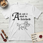 Ask and It Shall Be Fetched Border Collie T-Shirt flat lay in White, featuring a sparse pen-and-ink illustration of a Border Collie at a proud trot carrying a shofar.